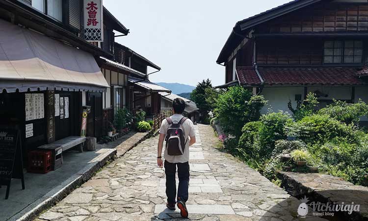 Magome-juku, street, traditional houses, man with backpack